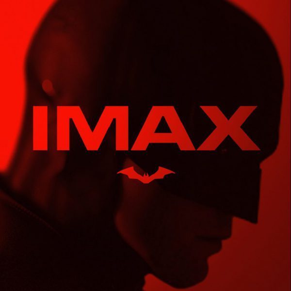 Silhouette of a superhero with the IMAX logo in the background.